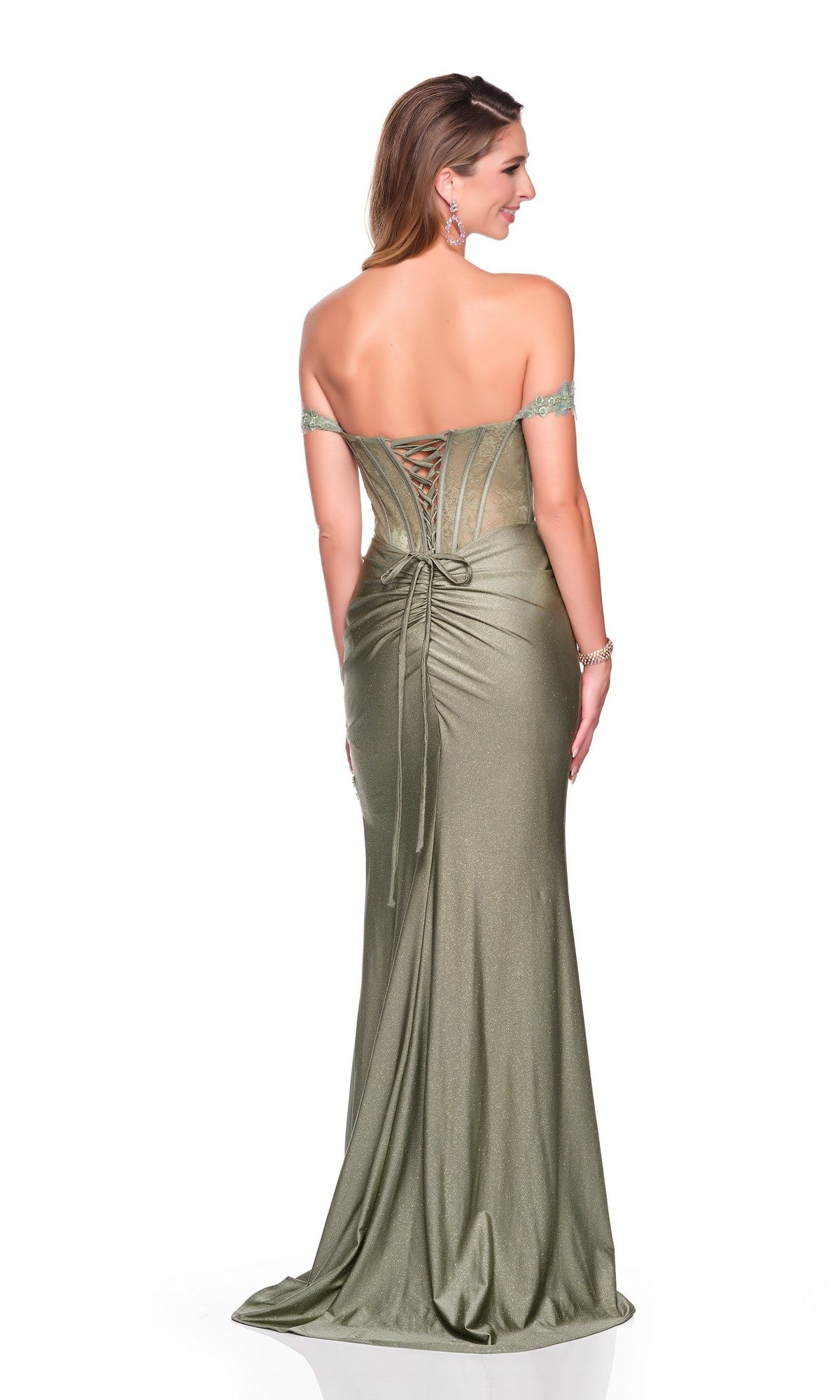 A woman in the Dave and Johnny 12490 long prom dress—an off-the-shoulder, metallic olive green corset style with a lace-up back and draped train—stands against a white background.